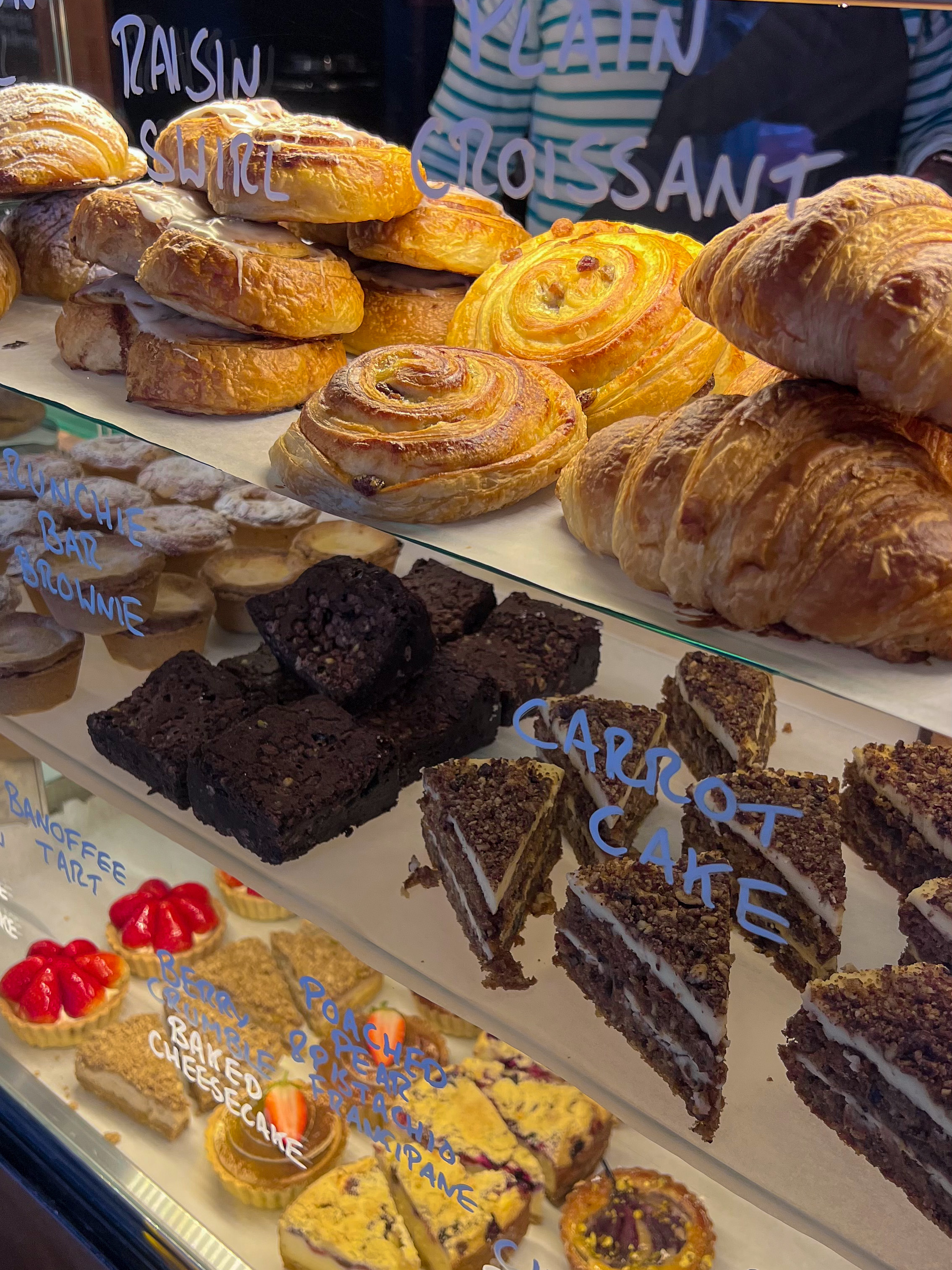 Sweet treats and pastries on display at Manna House Bakery