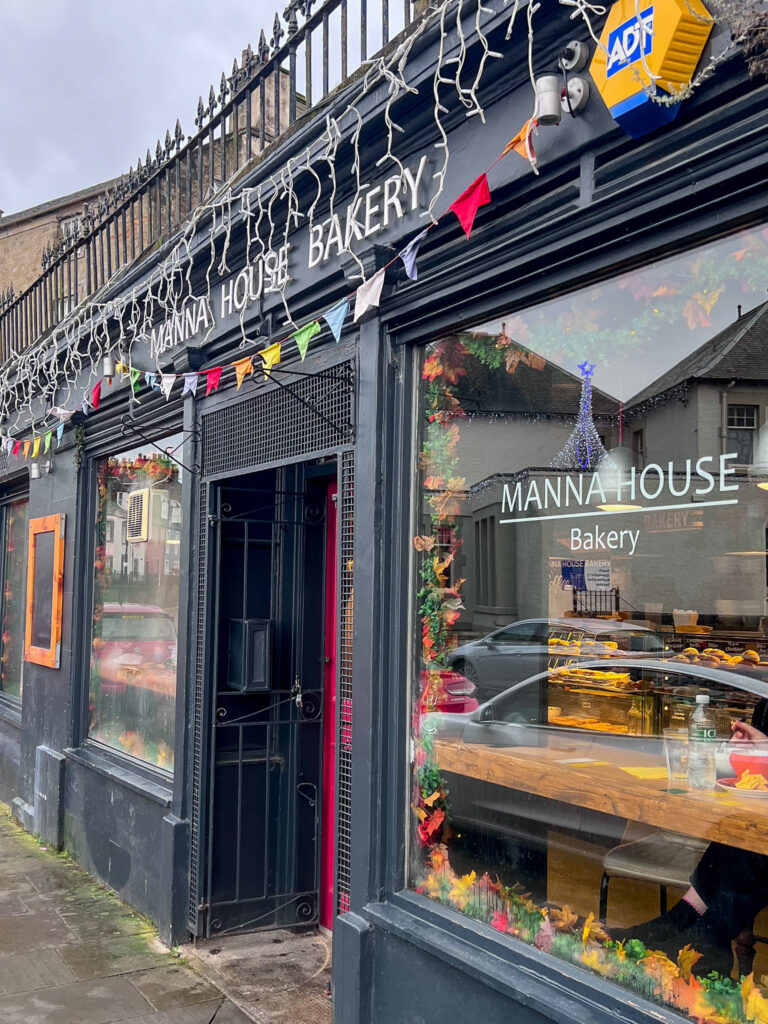 Exterior of Manna House Bakery with colourful bunting