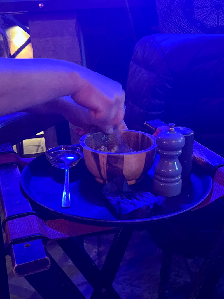 Waitress making guacamole