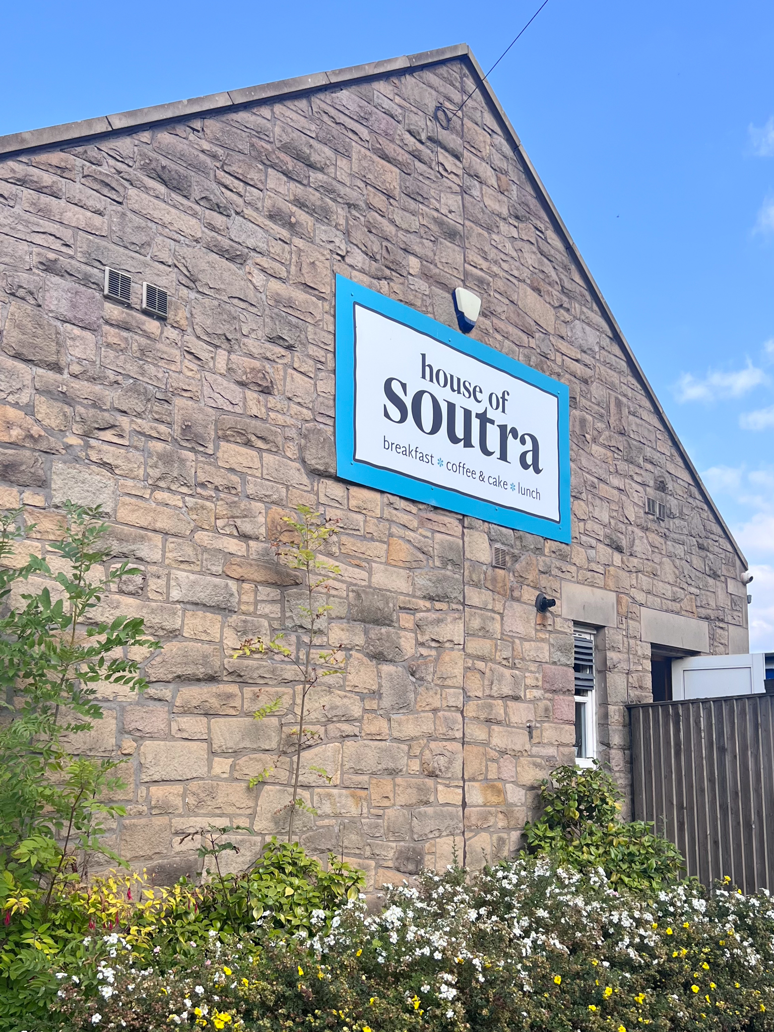 Front sign of House of Soutra