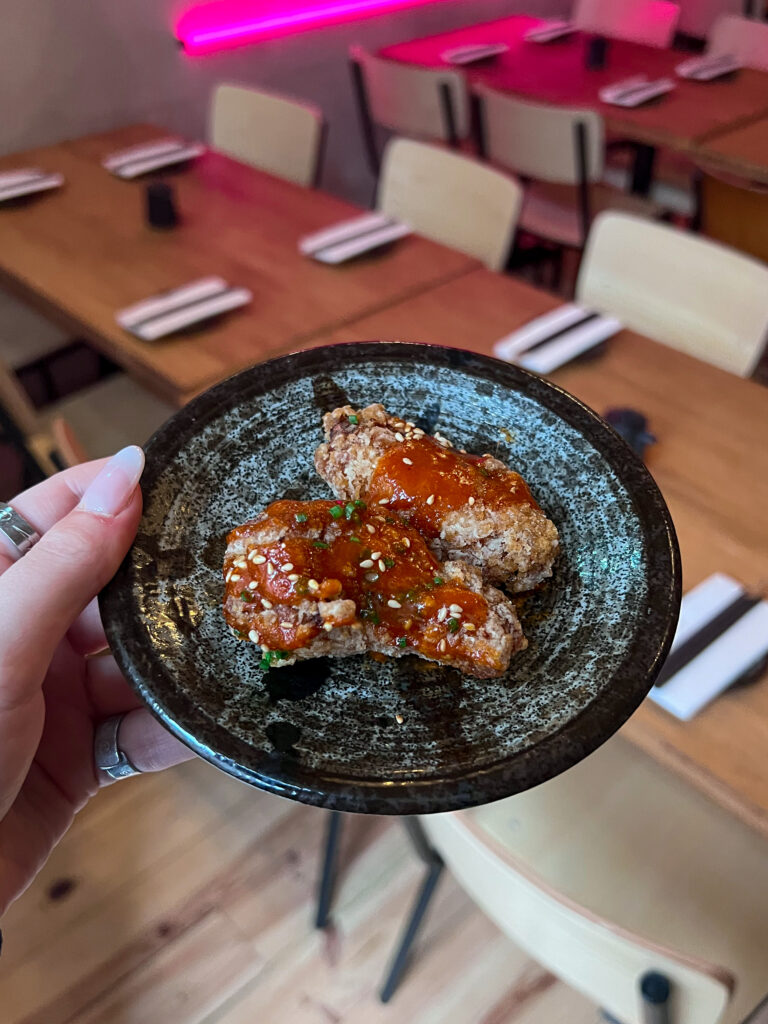 Chicken wings on a small plate from Lucky Yu