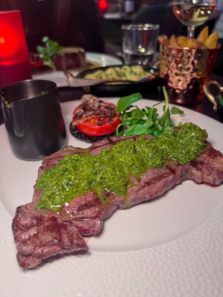 Sirloin steak topped with green pesto from The Merchant Steakhouse